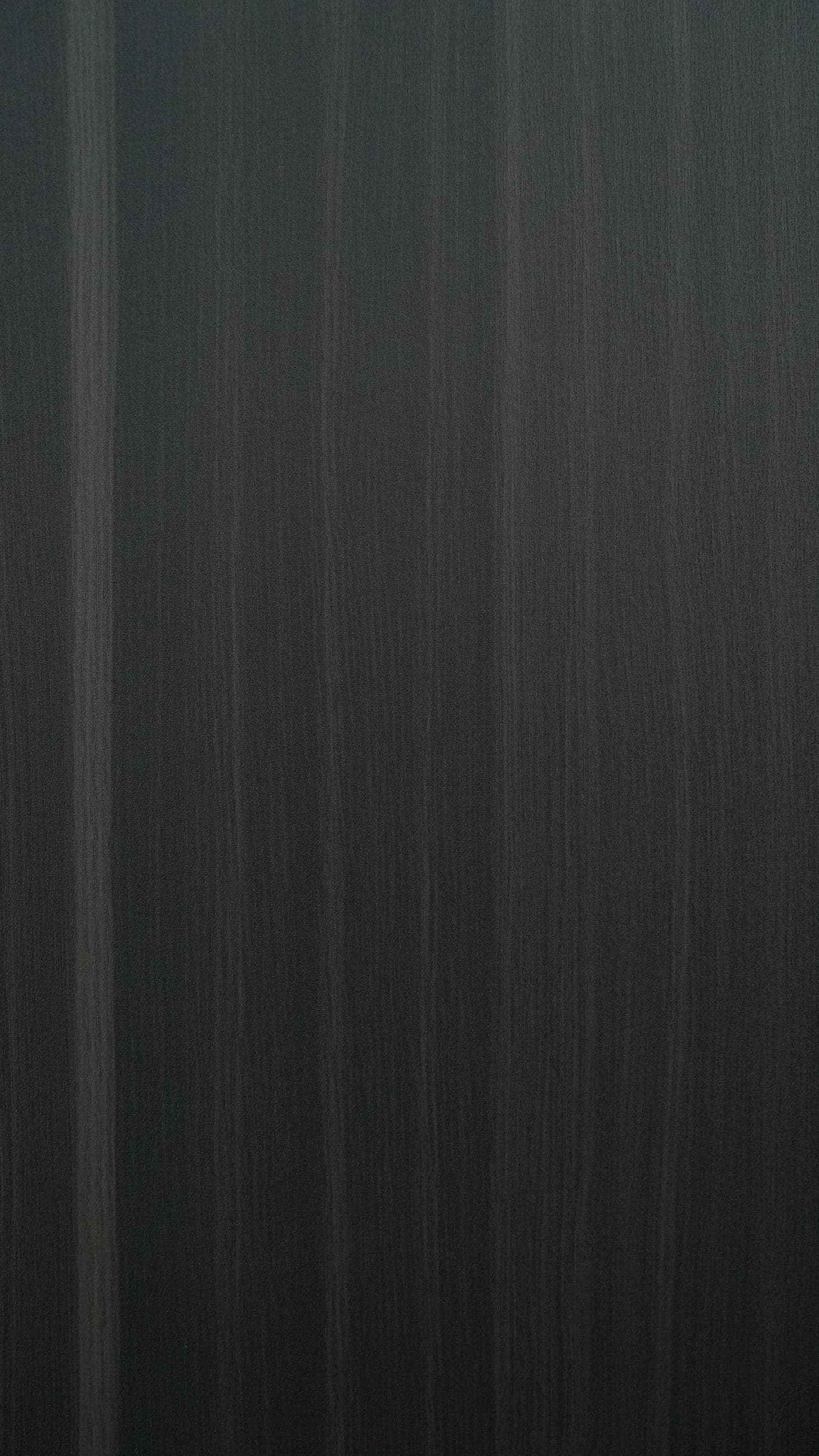 Near-black wood swatch with fine, tightly spaced vertical grain lines.
