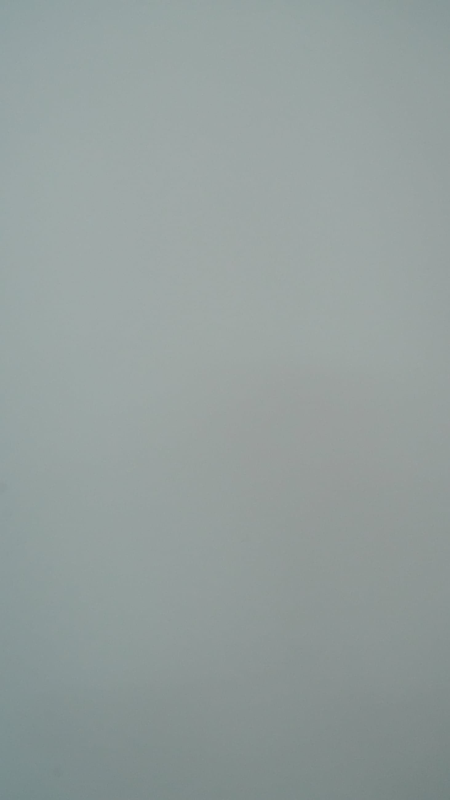 Flat, matte pale blue-grey swatch with no texture or figure.